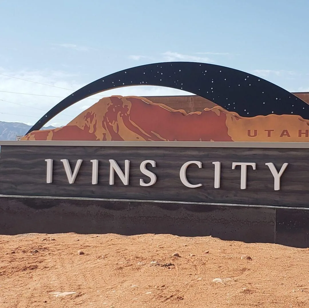 Ivins City entrance sign with Southern Utah red rock landscape in Ivins, Utah